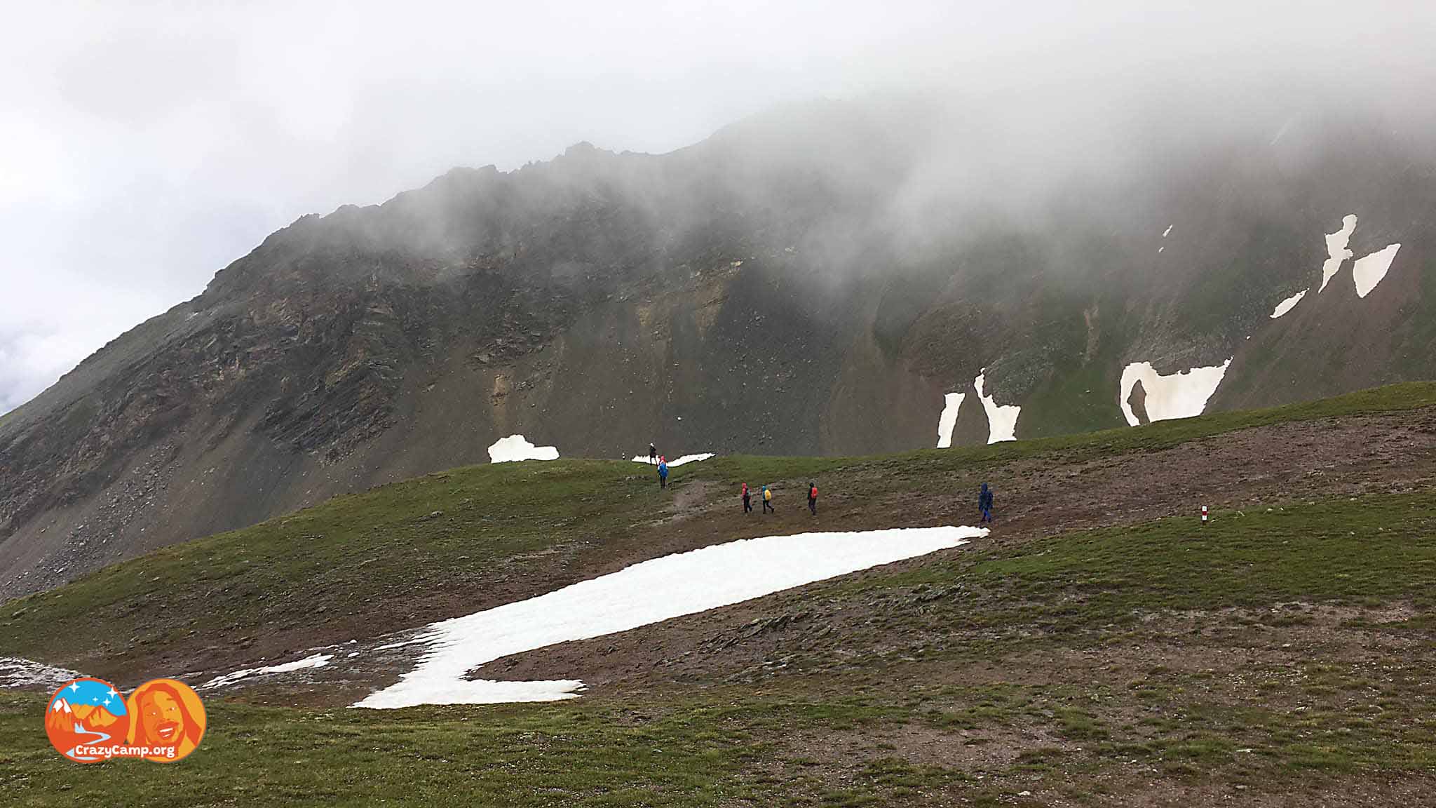 hikers at a snowfield